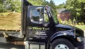 truck carrying sod